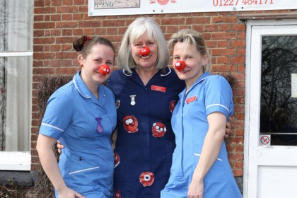 RGN Nurse Gill Wren is joined by Rebecca (L) and Anna to parade their outfits.